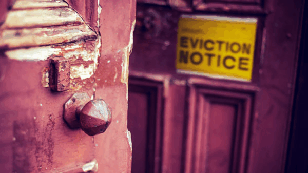 officer and eviction notice