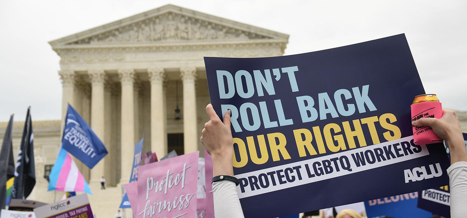"Don't roll back our rights" protest sign in front of the U.S. Supreme Court
