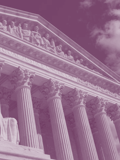 Image of the Supreme Court with a purple filter overlay