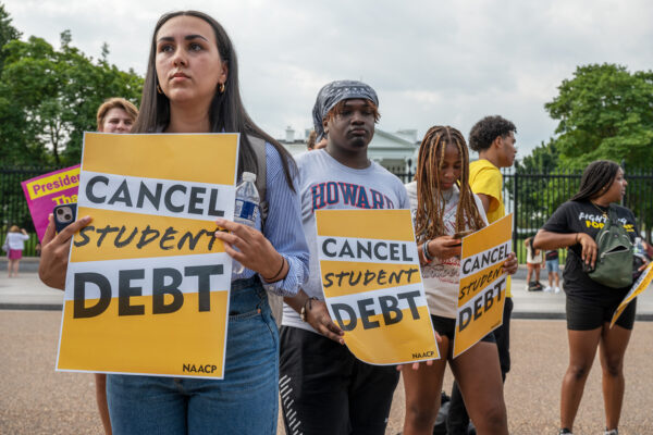 People protesting for student loan forgiveness.