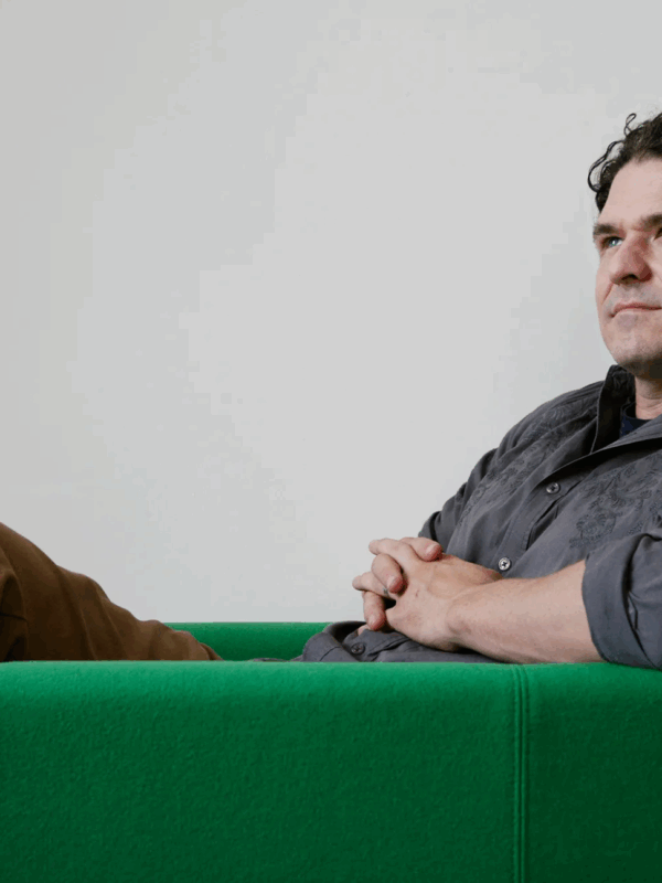 Dave Eggers in a green chair
