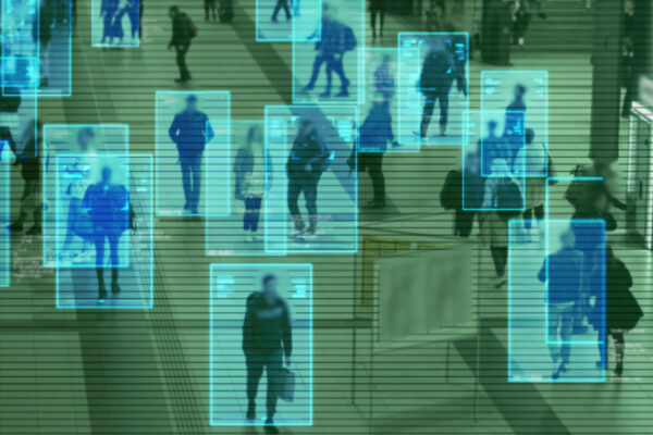 Scanning the crowd of people walking at the railway station. Surveillance interface using artificial intelligence and facial recognition.