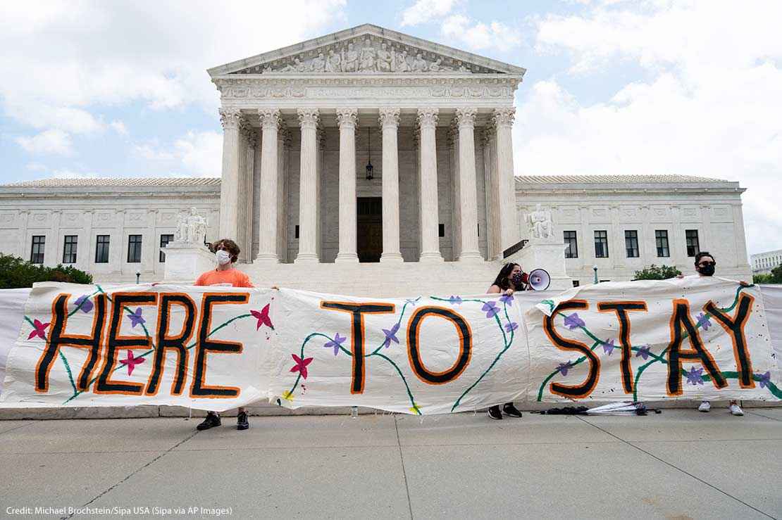 "Here to Stay" banner at a rally in favor of DACA (Deferred Action for Childhood Arrivals) is seen in front of the Supreme Court.