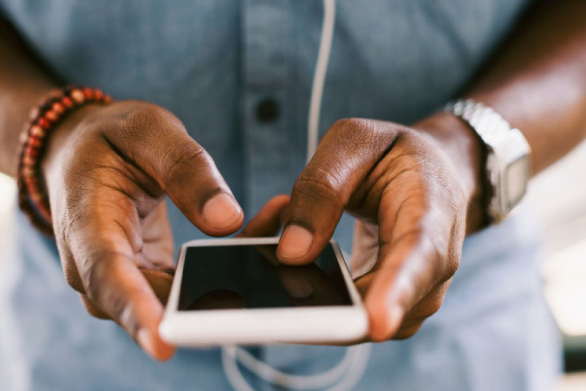 Hands holding a phone 