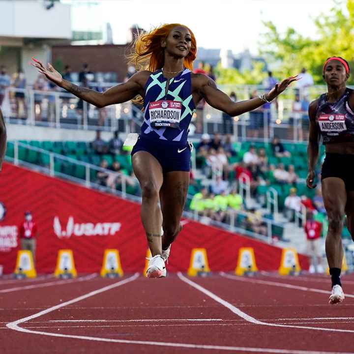 Sha'Carri Richardson celebrates after winning during fourth heat at Olympics 2021