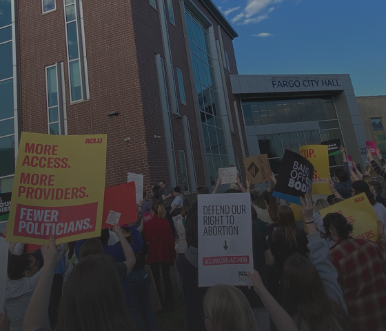 Image of a protest in front of the Fargo City Hall